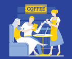 Young Couple in a Coffee Shop using Touch Screen Gadget and Laptop