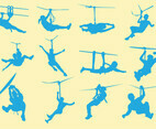 Silhouette Of People In Zipline