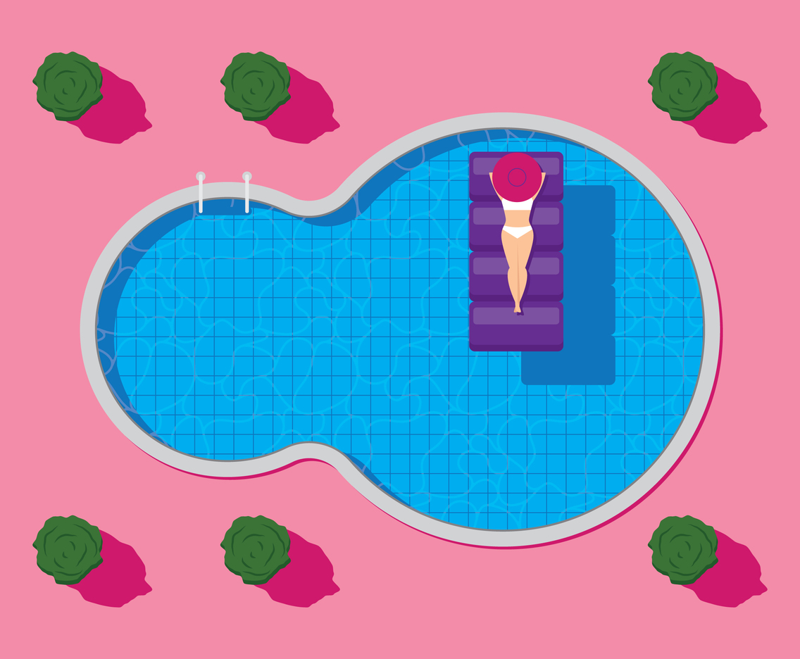 Woman Floating On Swimming Pool