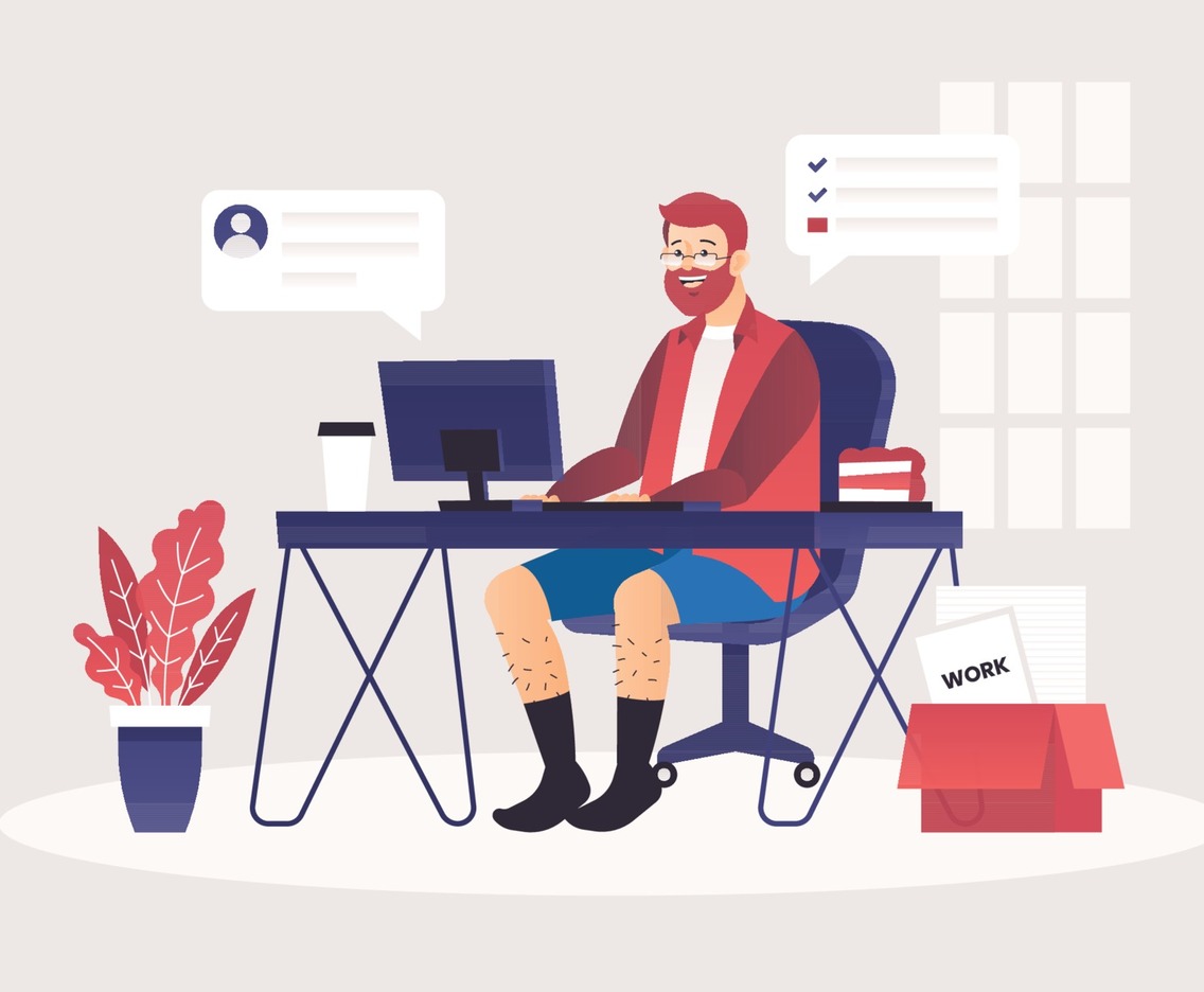 A Man Works from Home Using a Computer