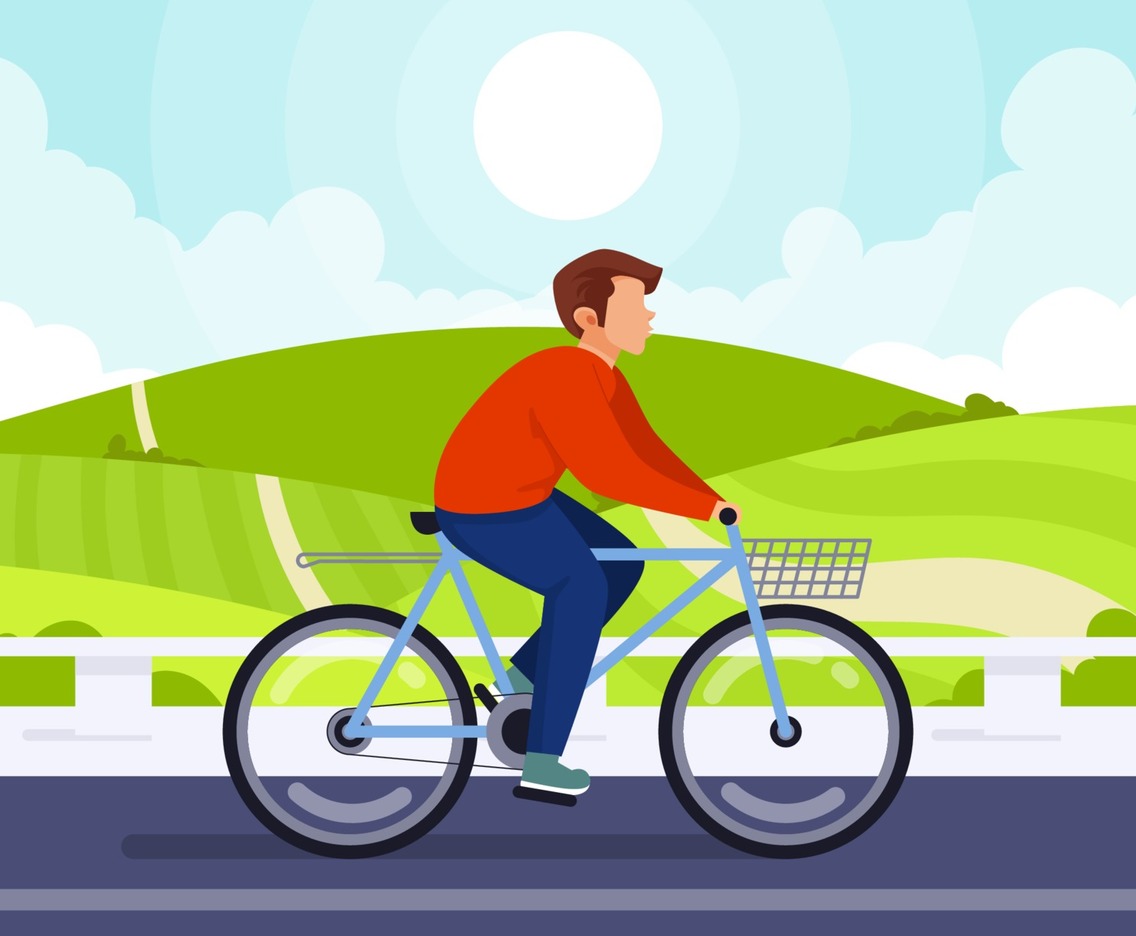Man Riding Bicycle on Hill