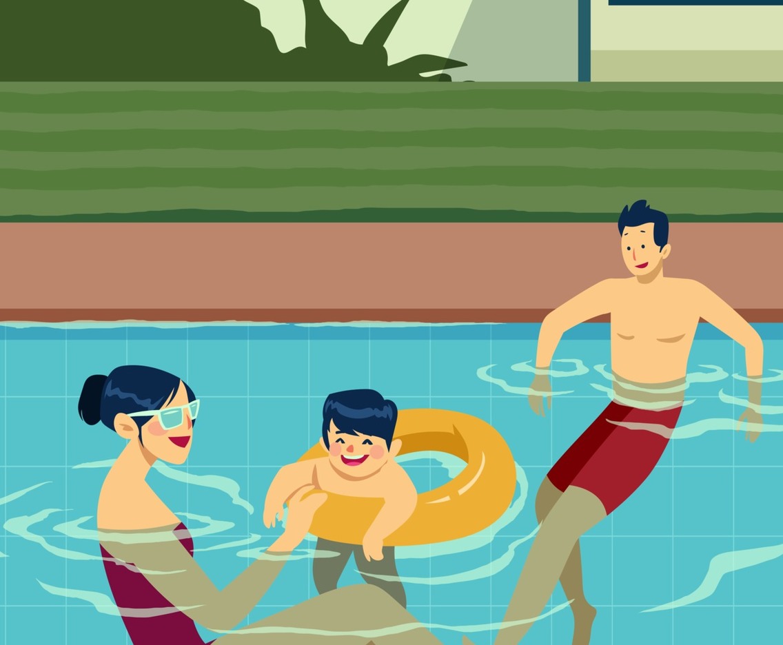 Happy Family Having Fun at the Swimming Pool