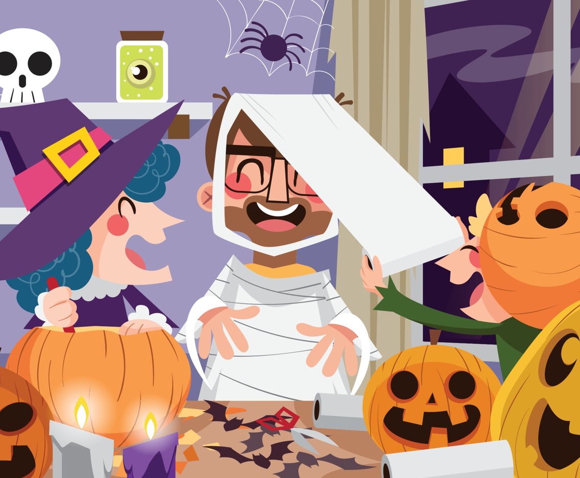 Happy Family Preparing for Halloween Concept