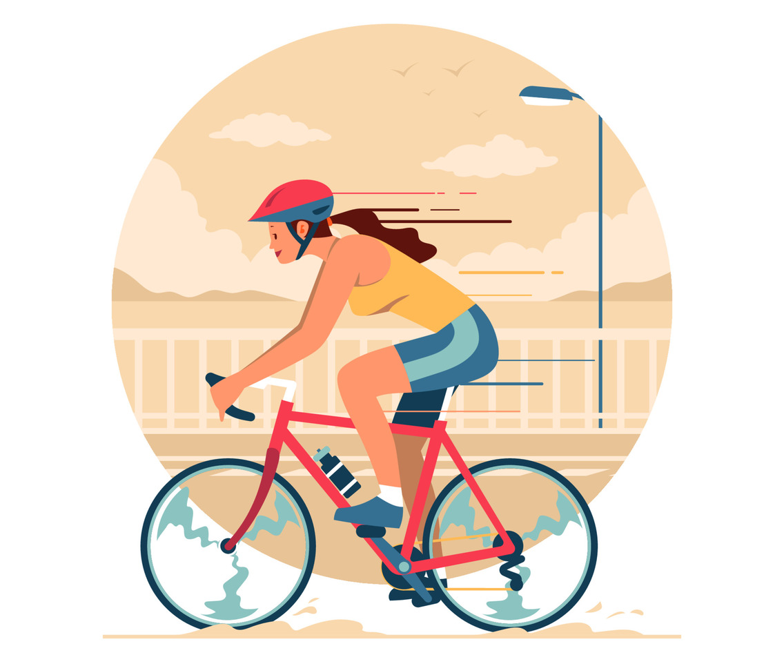 Female Cyclist Rides a Bicycle
