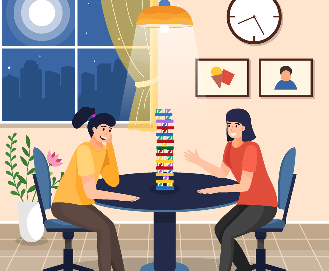 Cheerful Sisters Playing Game at Night