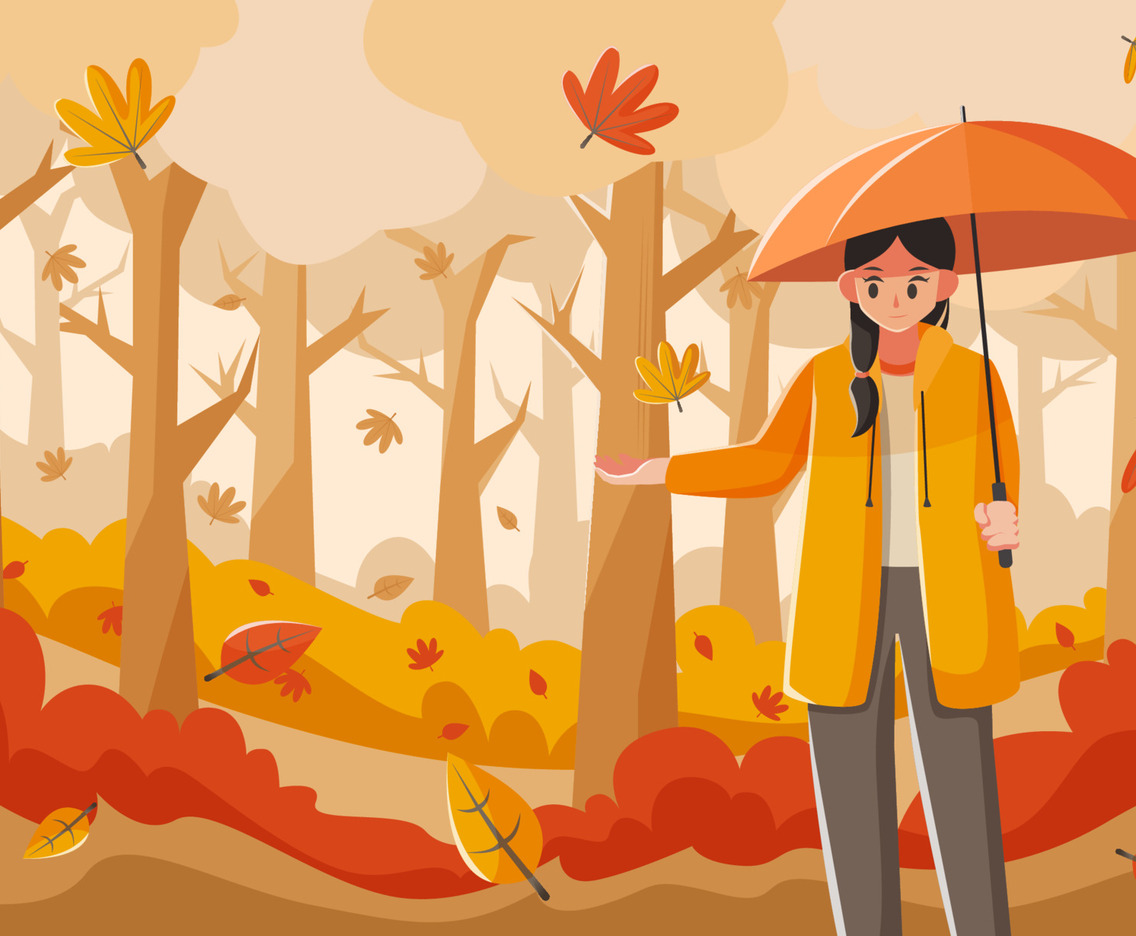Beautiful Woman is Enjoying the Beauty of the Fallen Leaves in Autumn