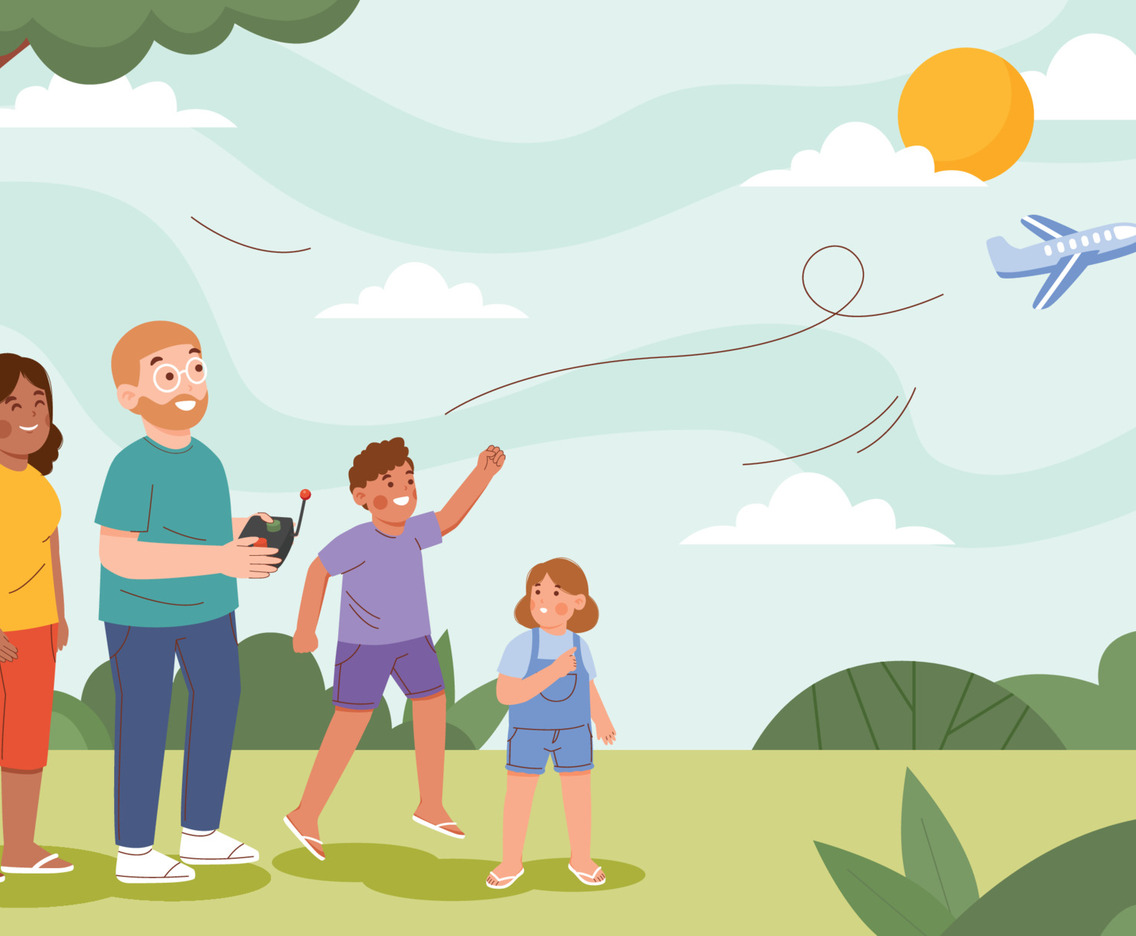 Happy Family Playing Remote Controlled Airplane in Park