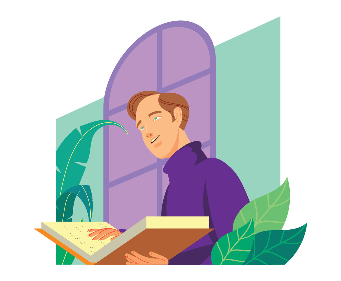 A Boy Reading His Braille Book