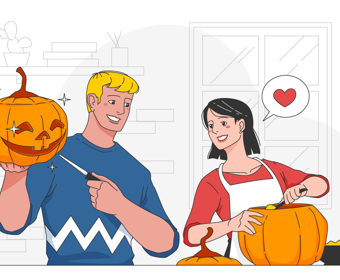 Couple Happily Decorating Pumpkins for Party
