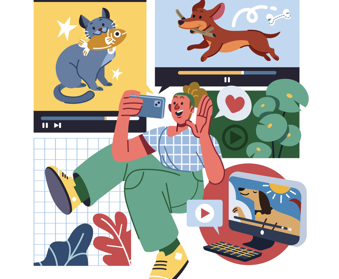 A Woman Watching Cat And Dog Videos