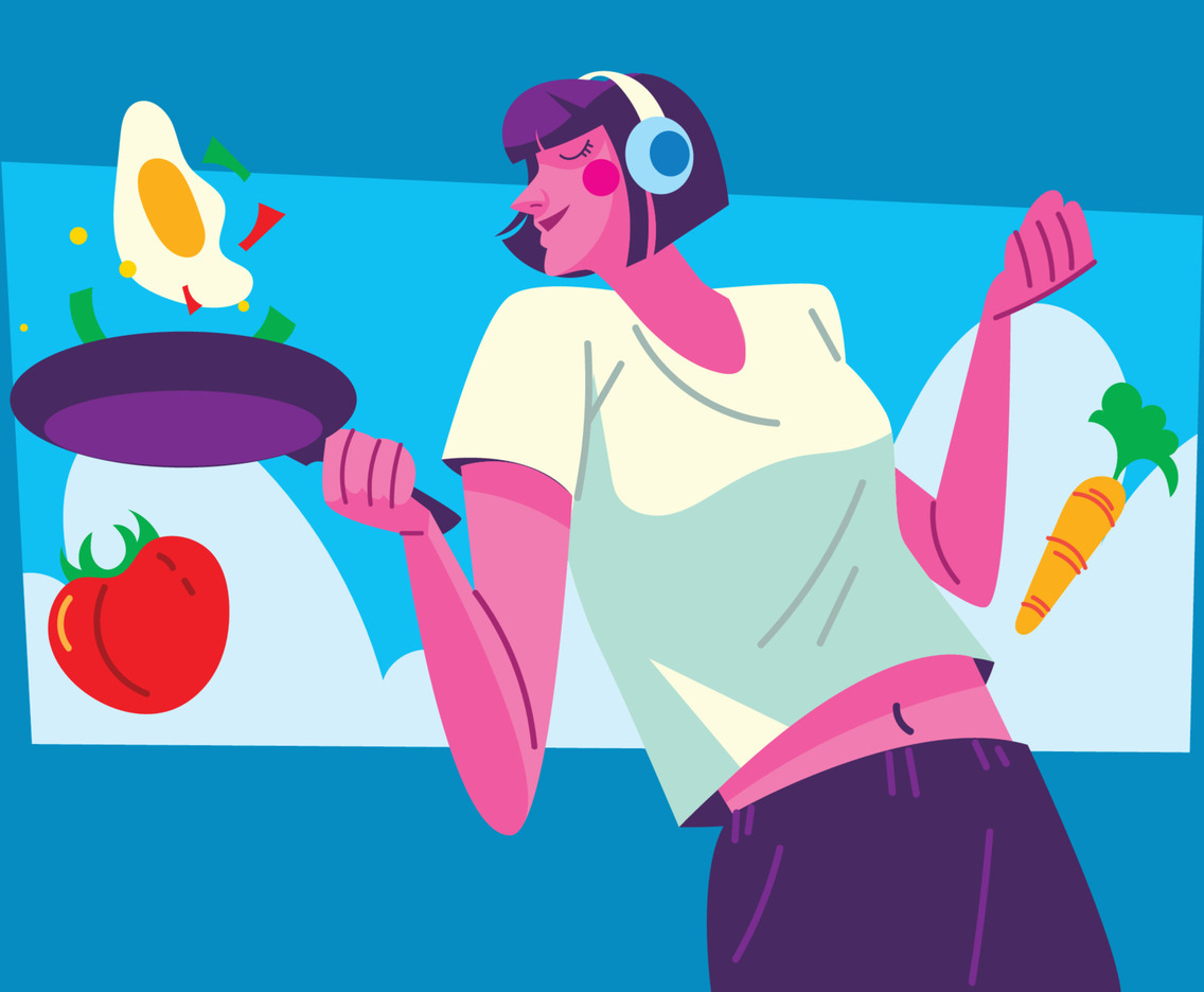 Happy Cute Girl Cooking and Listening Music with Her Headphones