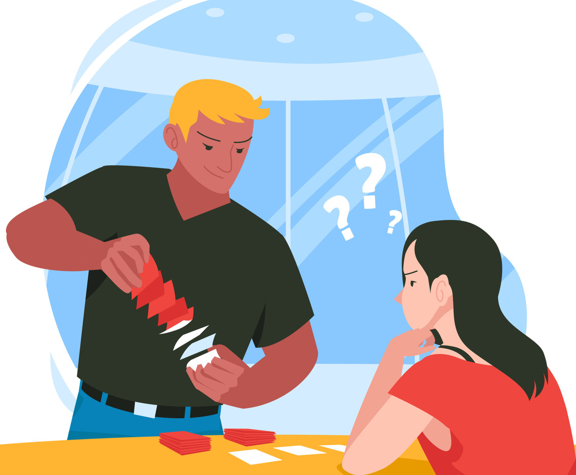 A Young Man Shuffling Card to Prepare the Match with His Girl Friend